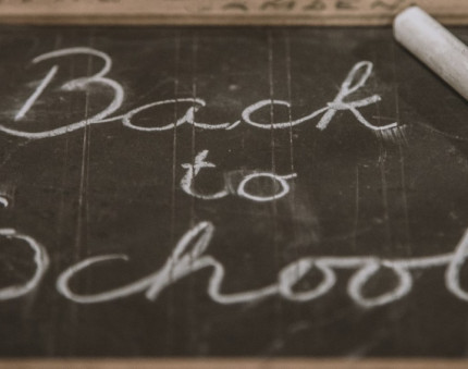 Back to school written on a chalk board