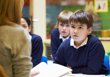 Students listening in a classroom