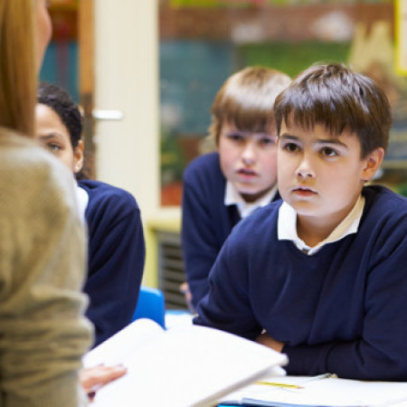 Students listening in a classroom