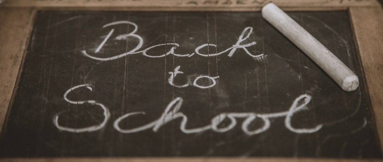 Back to school written on a chalk board